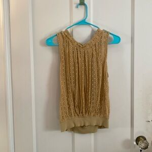 Free people lace blouse with bow and open back.